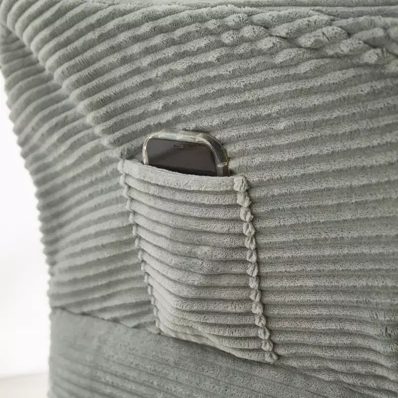 Poltrona accent lounge moderna con pouf, braccioli e tasca laterale