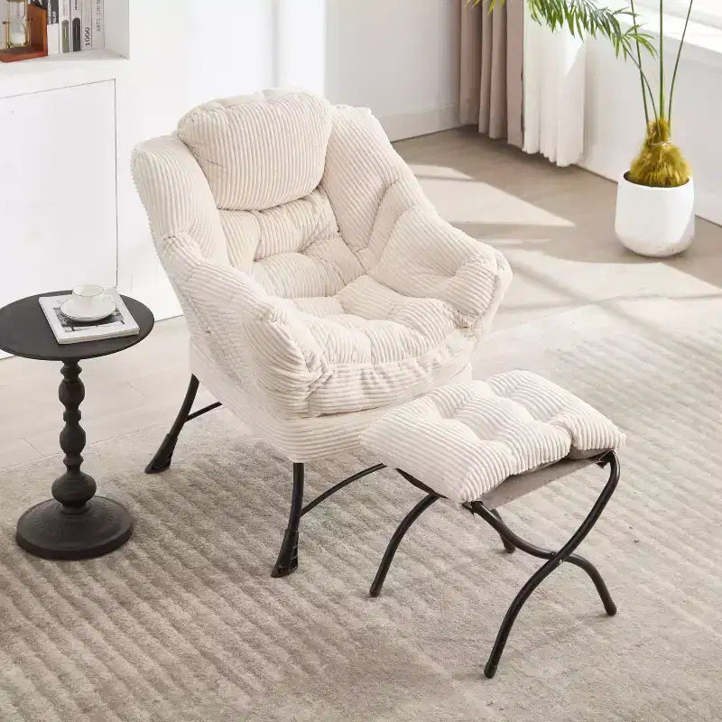 Poltrona accent lounge moderna con pouf, braccioli e tasca laterale