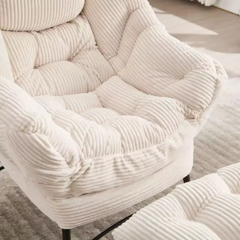 Poltrona accent lounge moderna con pouf, braccioli e tasca laterale
