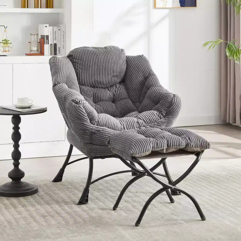 Poltrona accent lounge moderna con pouf, braccioli e tasca laterale